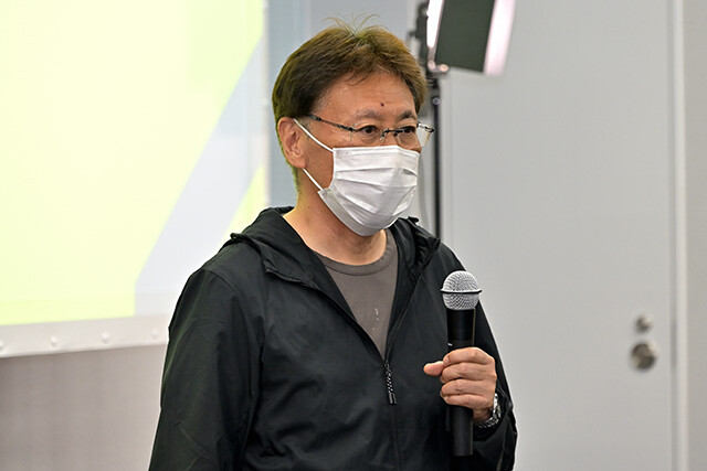 ヤマハ発動機モトロイドプロジェクトリーダー・浅村欣司氏。モトロイドのプロジェクトリーダー。試作１号機は「鉄骨くん」で、２号機は「クララ」と呼んでいたという