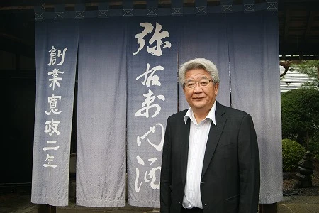 佐藤社長。本業の大和川酒造の酒蔵にて。日本で唯一酒米を100%自社で栽培、原発爆発では「もう終わりだ」と衝撃を受けた。