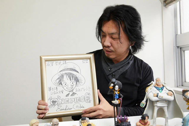 世界にコミックスの巻数しかないこの色紙の裏に、尾田先生からの直筆コメントも書いてある