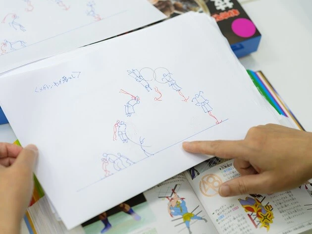 芳賀さんが描いたメガトン・キング落とし展開図。これをもとにイラストレーターさんへ指示を出す。芳賀さん自身も絵がうまい