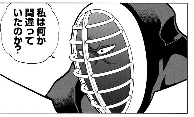 試合前のネメシスに対し、自問自答のような問いかけを発した武道。ネメシスの返答を受けて、再び血走った目に戻る