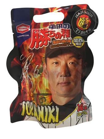 勝ちの種ＴＯＲＡＮＩＫＩバージョン（２０１６年［最新作］）　プロ野球・阪神タイガースとのコラボ商品。球場でビールを飲み、柿の種を食べて応援だ
