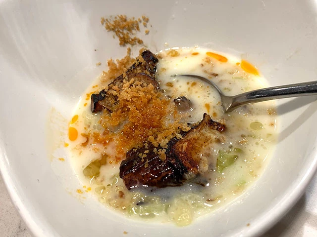 「タコとイベリコのポテトスープ、ペッパーオイル」