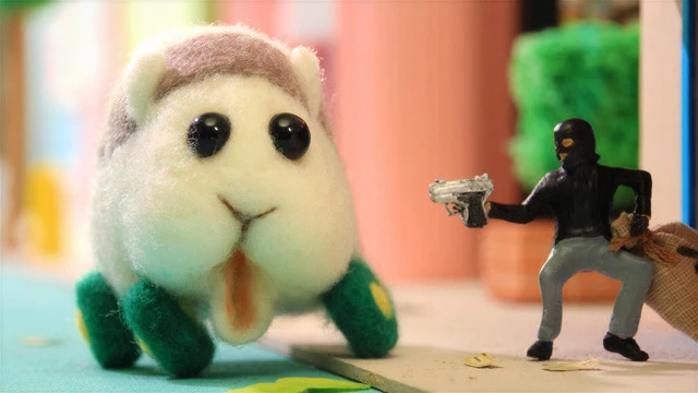 モルカーはフェルトパペット、人間はジオラマ人形と実写で描かれる