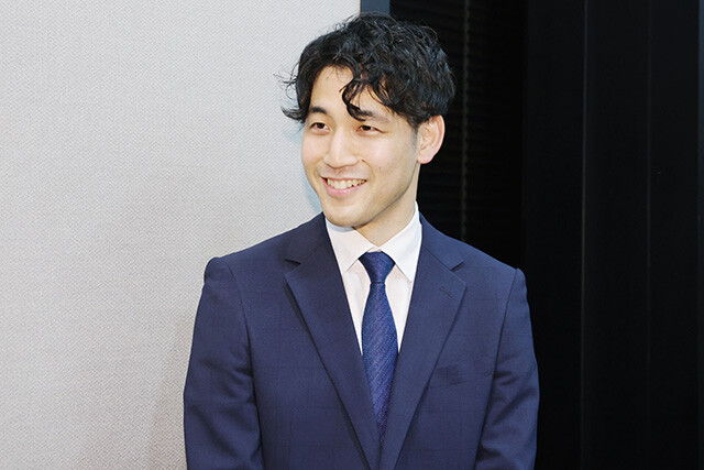 タニタ開発部の和智湧斗さん。タニタが長年積み重ねてきた測定技術をベースに、全身の形状を推定する独自のアルゴリズムを開発