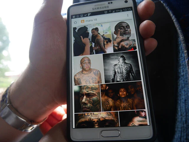 バスで隣に座った現地のおじさん（ライフル所有）が見せてくれた、ホンデュラスの凶悪犯罪集団「マラス」の写真