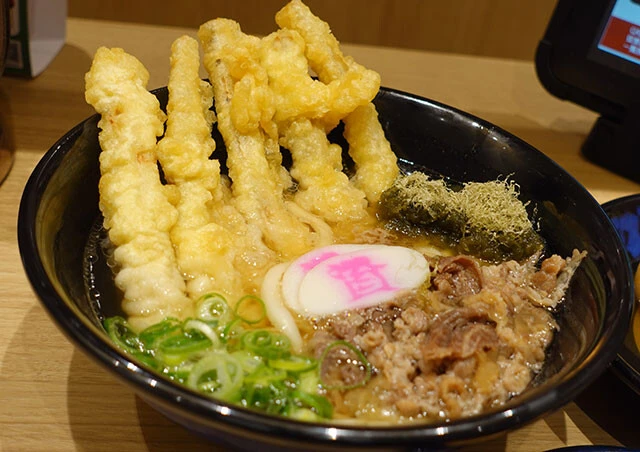 看板メニューの肉ごぼ天うどん