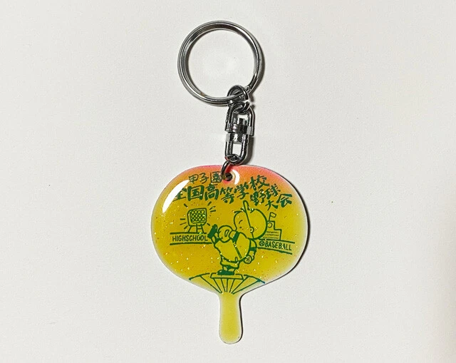 スタンドで使ううちわ形。珍しく大会名が表記されている