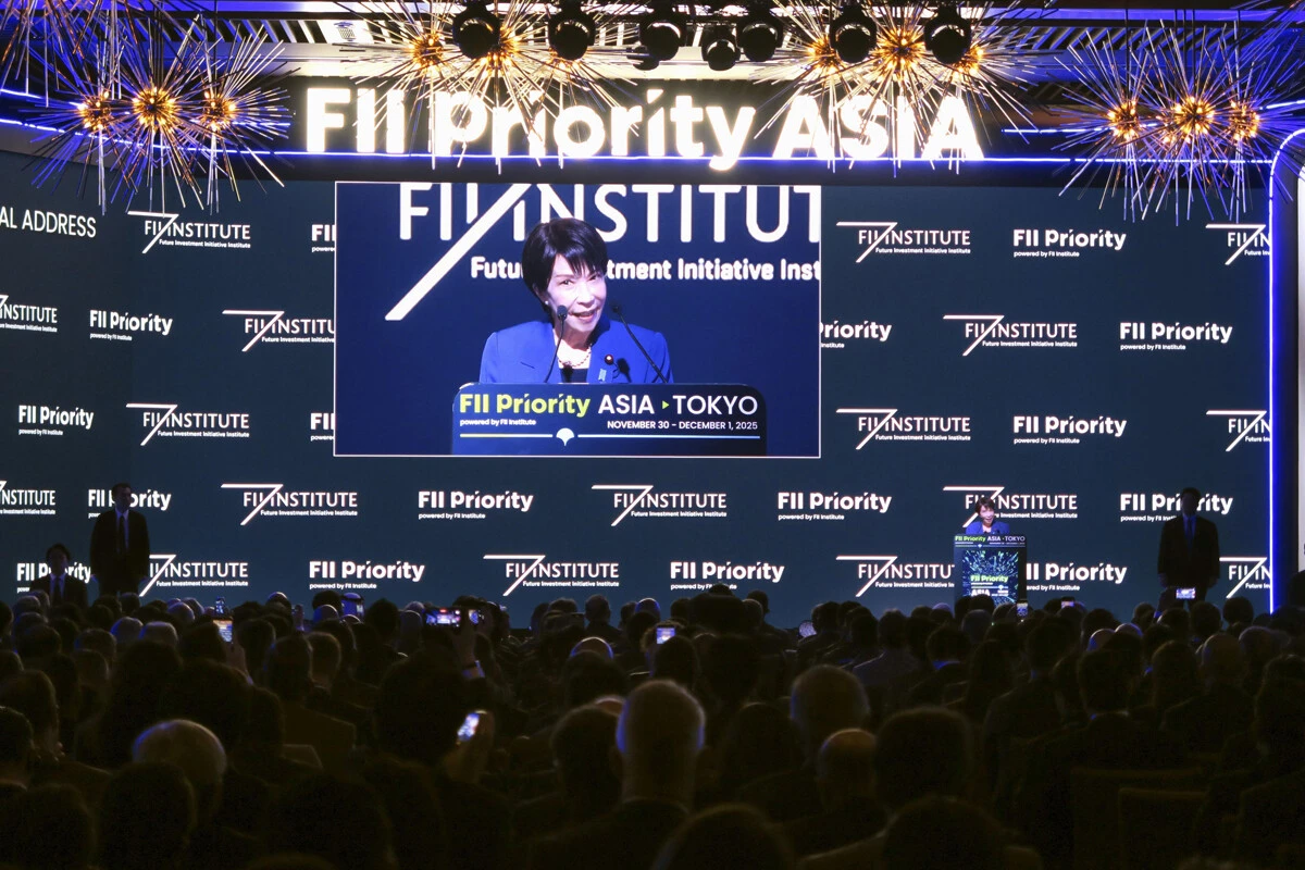 12月1日、東京都港区で開催された国際金融会合で、対日投資の拡大を呼びかける高市首相