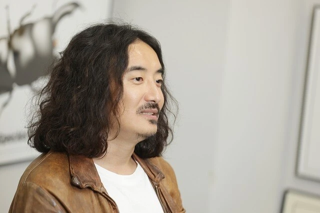 「伝播力が上がり強毒化する。新型コロナがそんな進化をするなんて想定していた人はほとんどいない」と語る佐藤教授