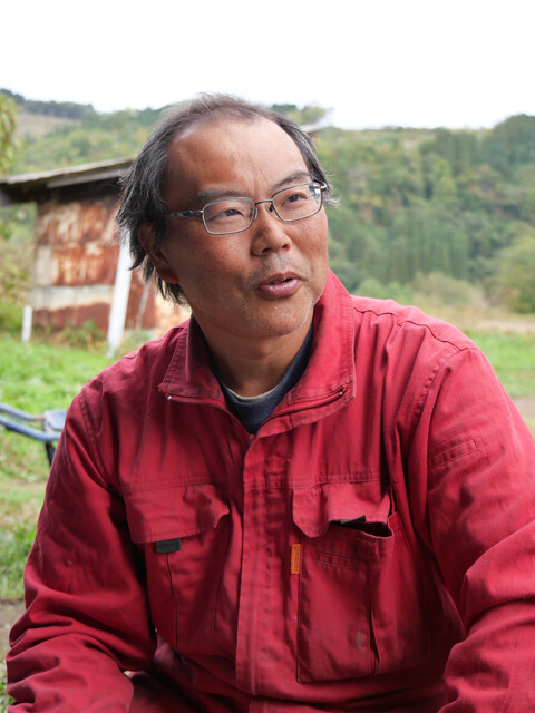 農家を営む冨田直和さん。「クマに常に人間の存在を知らしめるよう生活すれば、過剰に怖がる必要はない」と語る