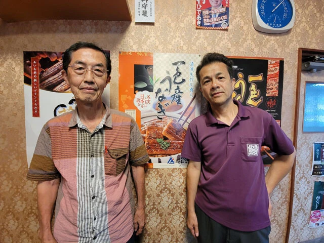 三河一色めすうなぎ研究会理事の石川晋治氏（右）と、同研究会の理事で農学博士の大石一史氏（左）