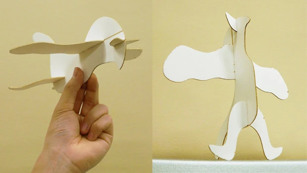 コンピューターによる最適化計算で、翼の位置や角度といったデザインを微調整した「一見飛ばなそうな紙飛行機」。どれもスイスイ飛んでいく。